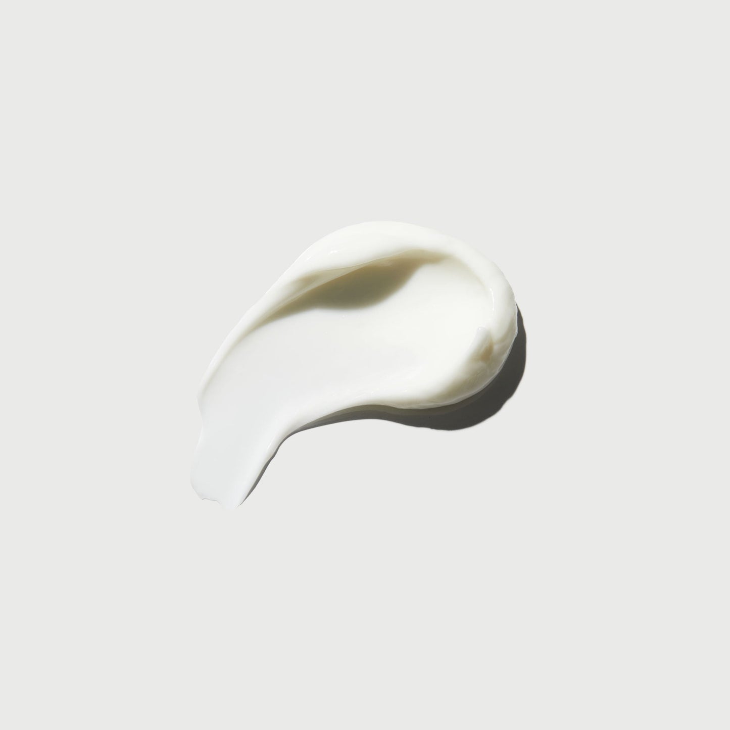 the-smoother-glycolic-acid-body-lotion-k9 NATR-40014-Swatch-The-Smoother-Glycolic-Acid-Body-Lotion-bonebkgd.jpg