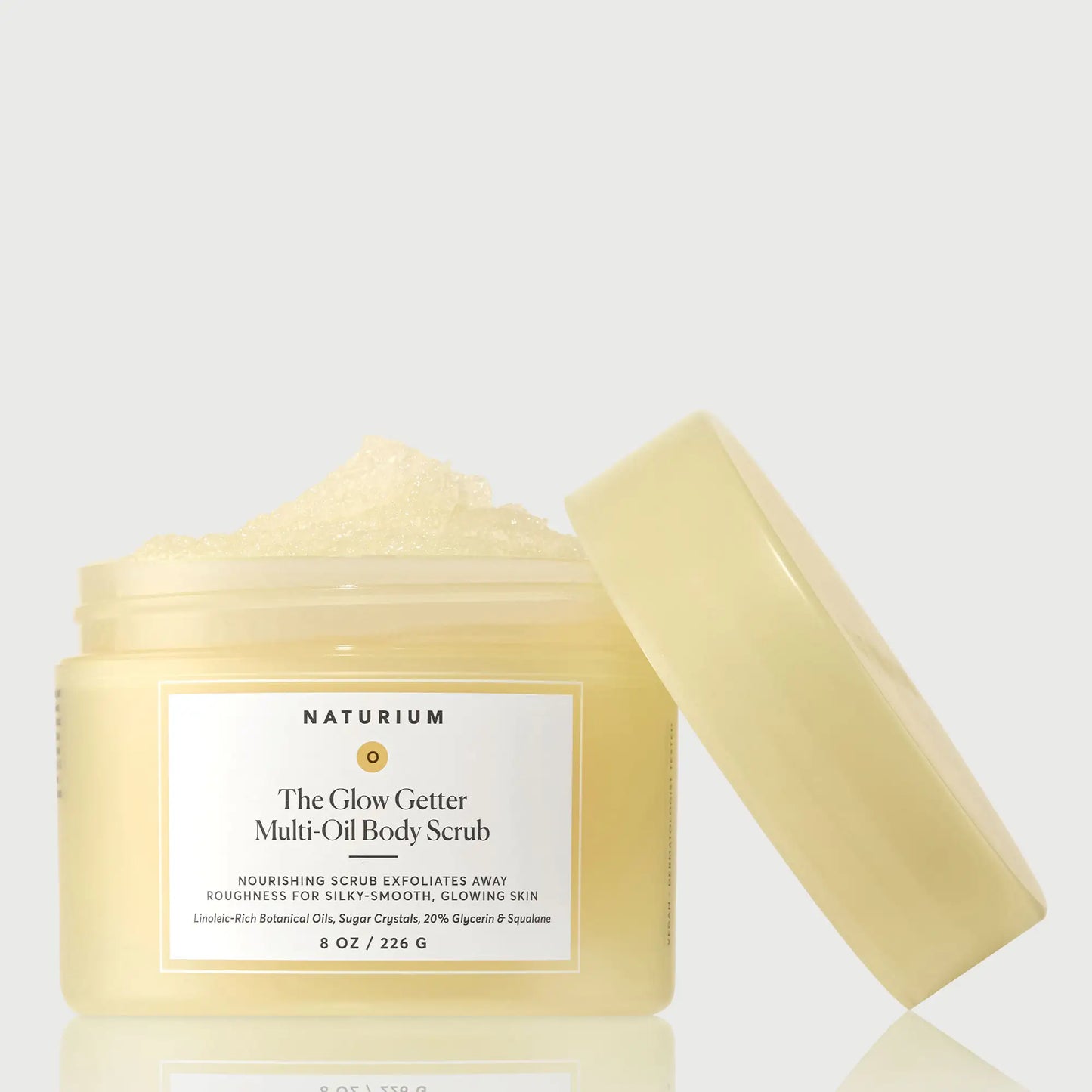 the-glow-getter-multi-oil-body-scrub-t9 NATR-40028-GlowGetter-Multi-Oil-Body-Scrub-Front-CapOff-bonebkgd.webp