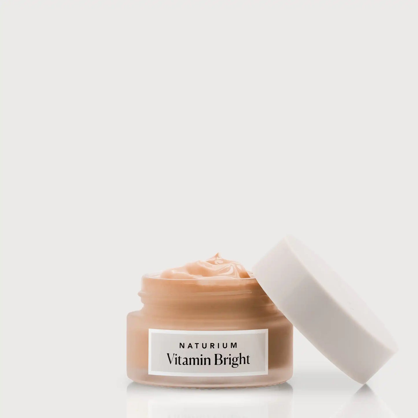 vitamin-bright-illuminating-eye-cream-b9 NATR-VitaminBright_DEEP_Primary_front_openjar_bone.webp