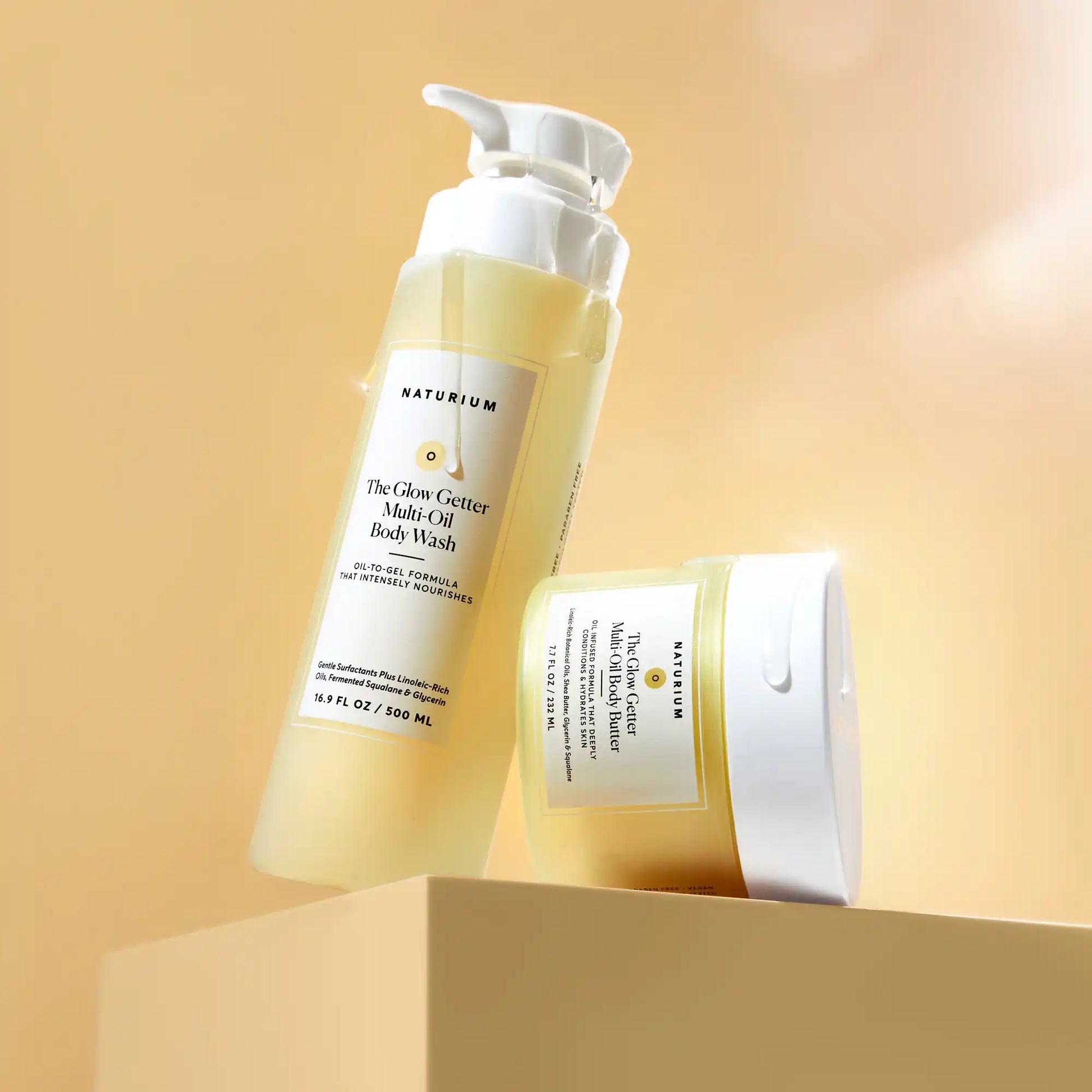 the-glow-all-out-body-bundle-y1 gg-bodybutter_1464-crop_revcolor_FL.webp